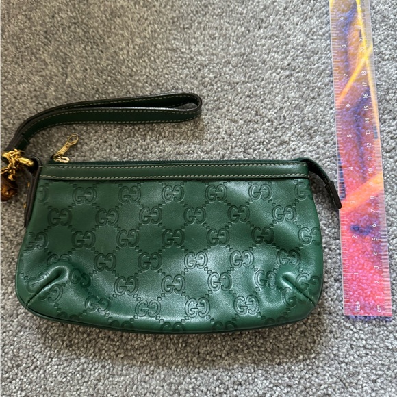 Like-new GUCCI wristlet - Picture 6 of 6